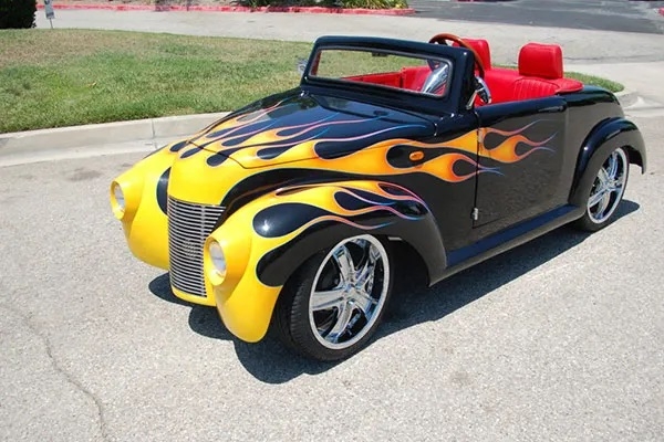 Black 39 Roadster with Yellow Flames affordable golf cart rental, golf cart rent on top of the world