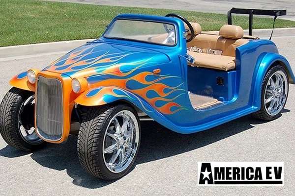 Blue California Roadster with Orange Flames affordable golf cart rental, golf cart rent on top of the world