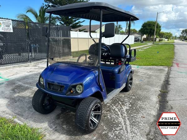 Blue EZGO 4 Passenger Golf Cart affordable golf cart rental, golf cart rent on top of the world