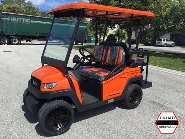 Orange Bintelli Beyond 4 Passenger Golf Cart affordable golf cart rental, golf cart rent on top of the world