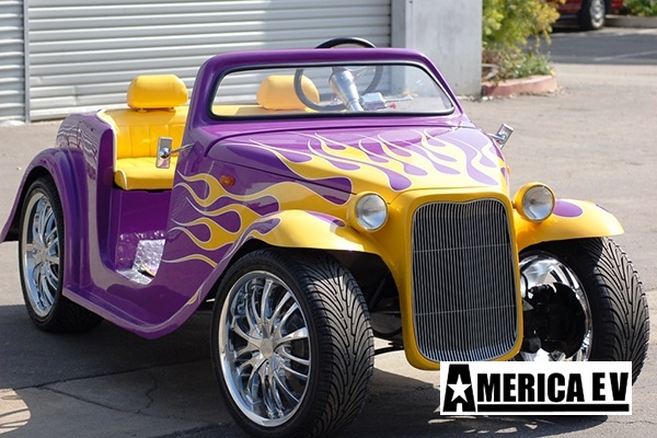 Purple California Roadster with Yellow Flames affordable golf cart rental, golf cart rent on top of the world