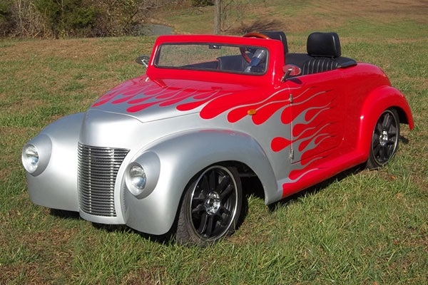 Red 39 Roadster with Silver Flames affordable golf cart rental, golf cart rent on top of the world