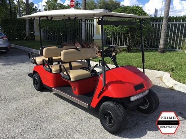 Red EZGO 6 Passenger Golf Cart affordable golf cart rental, golf cart rent on top of the world