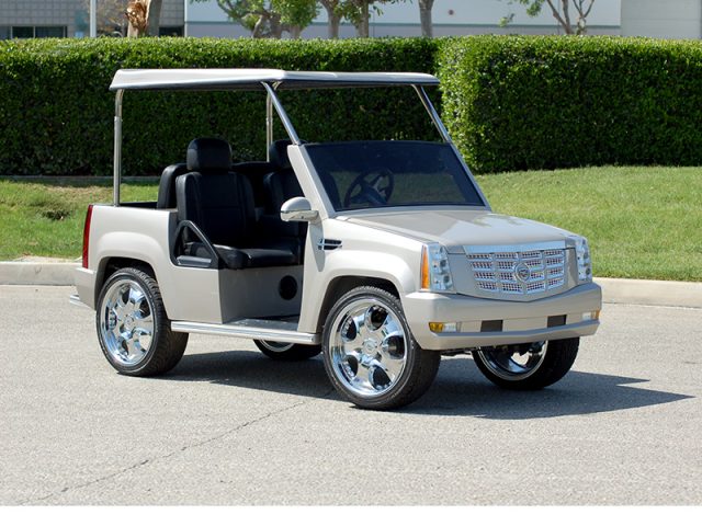 Silver Escalade Golf Cart With Roof and Custom Wheels affordable golf cart rental, golf cart rent on top of the world