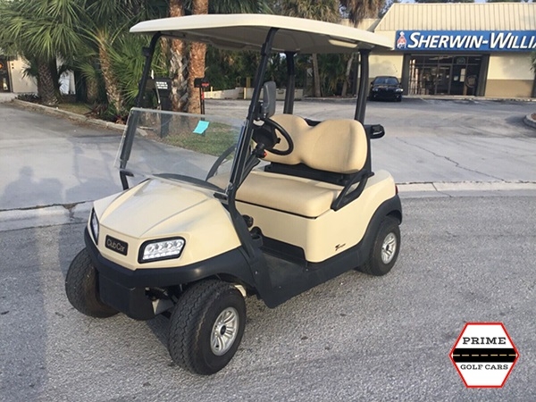 Tan Club Car 2 Passenger Golf Cart affordable golf cart rental, golf cart rent on top of the world