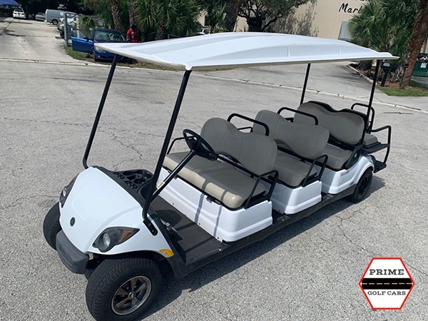 White 8 Passenger Yamaha Golf Cart affordable golf cart rental, golf cart rent on top of the world
