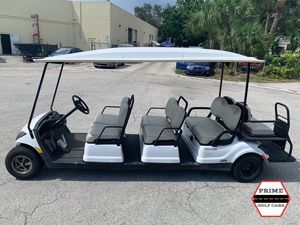 White 8 Passenger Yamaha Limo Golf Cart affordable golf cart rental, golf cart rent on top of the world