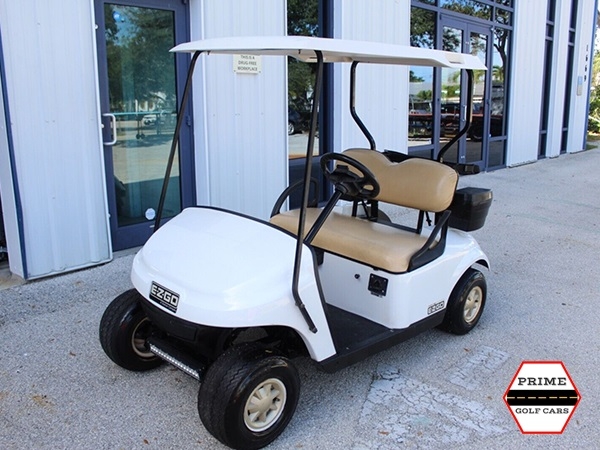 White EZGO 2 Passenger Golf Cart affordable golf cart rental, golf cart rent on top of the world